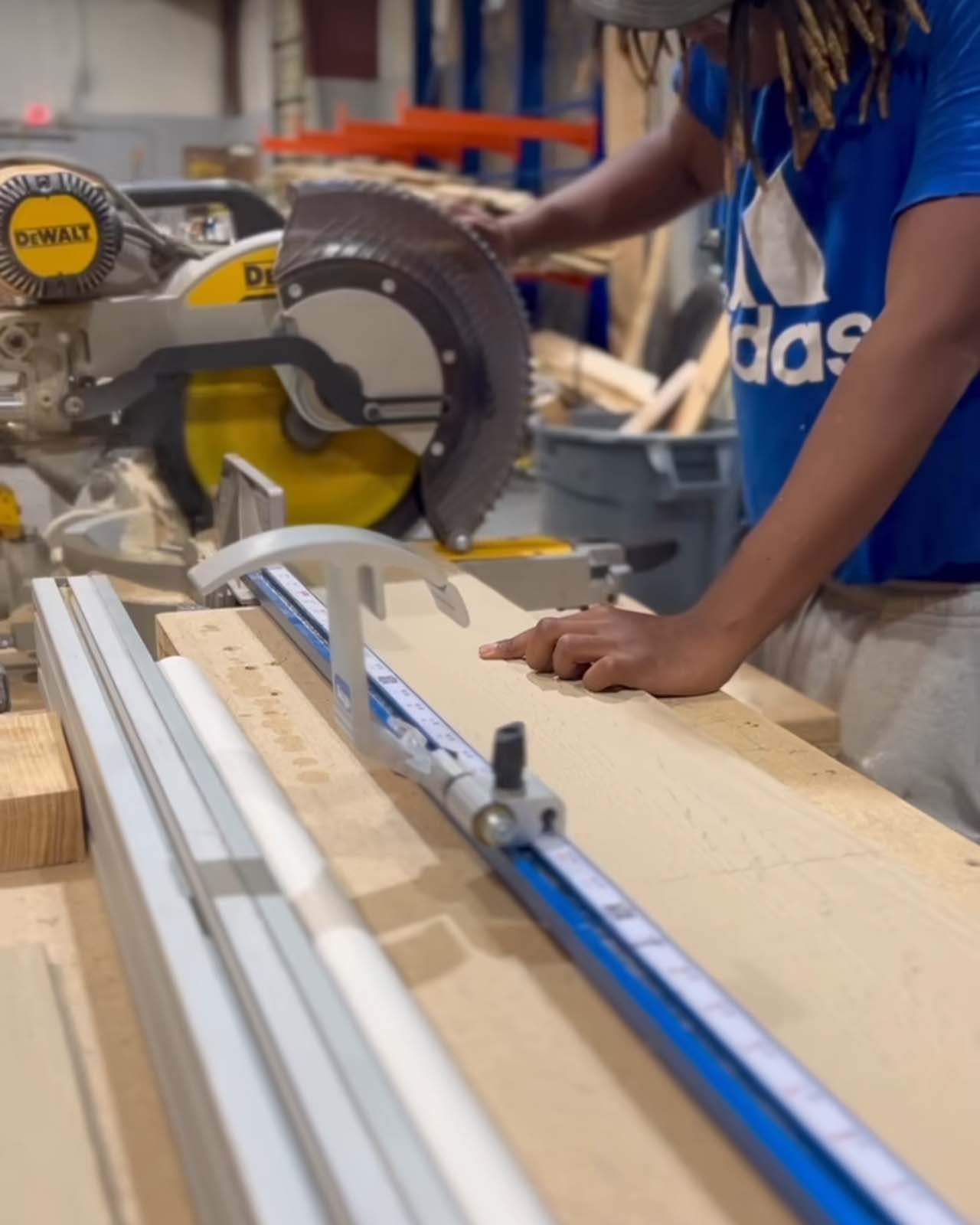 Space-saving prep area in Kingdom Tiny Home. Circular saw cutout transforms cutting board into a built-in countertop.