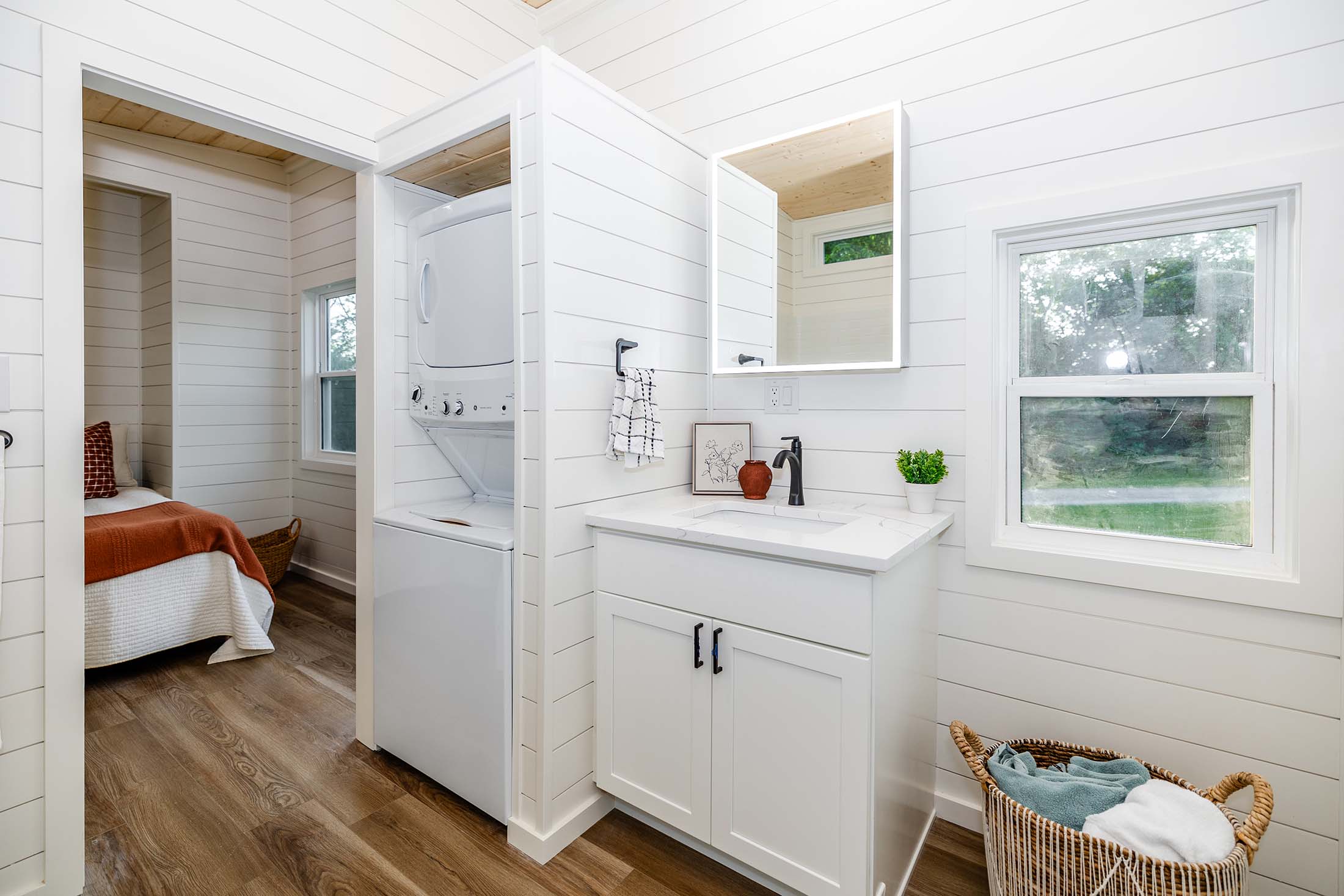 Stylish & functional L-Combo Unit for tiny homes. Compact bedroom, bathroom sink and washer dryer combo. 